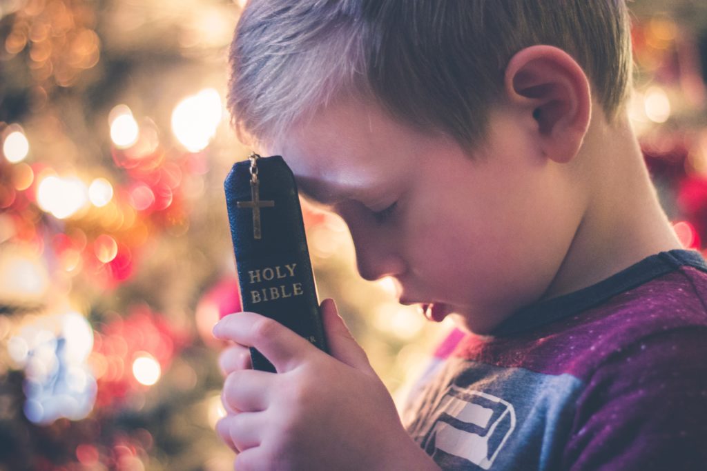 child with Bible-reading habit