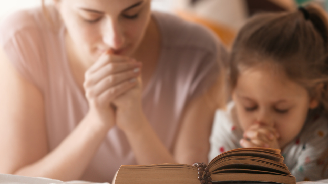 mother and daughter praying scripture over anxiety and worry