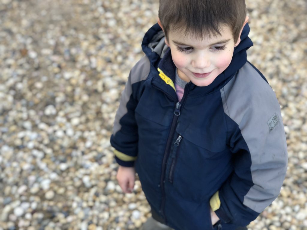 Little boy with a promise rock in his pocket, how to engage God with all 5 senses
